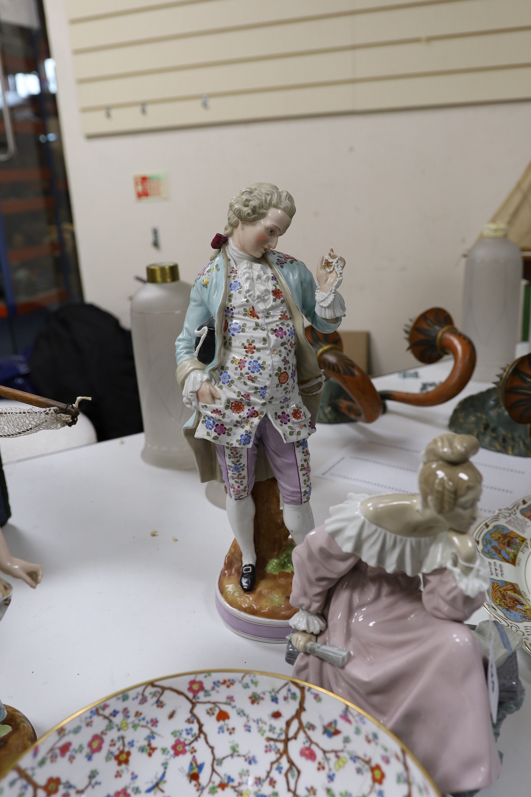 A pair of continental figurines, a Lladro figurine, Royal Doulton 'Diana' figurine, Spode bowl and two plates. Tallest 44cm